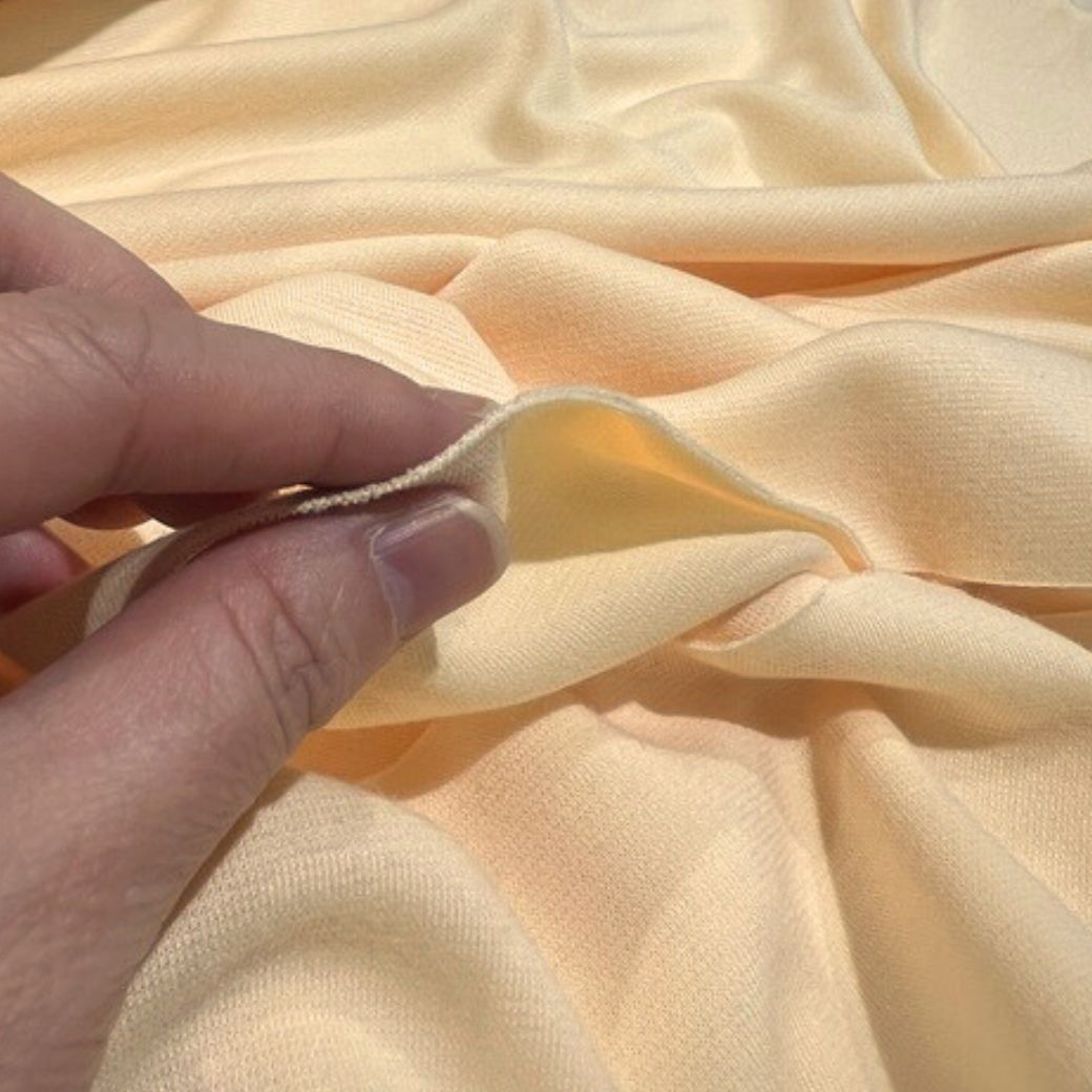 生地 【 ポンチニット クリーム 】 ニット ニット生地 巾165cm レーヨン・ポリエステル ポンチ