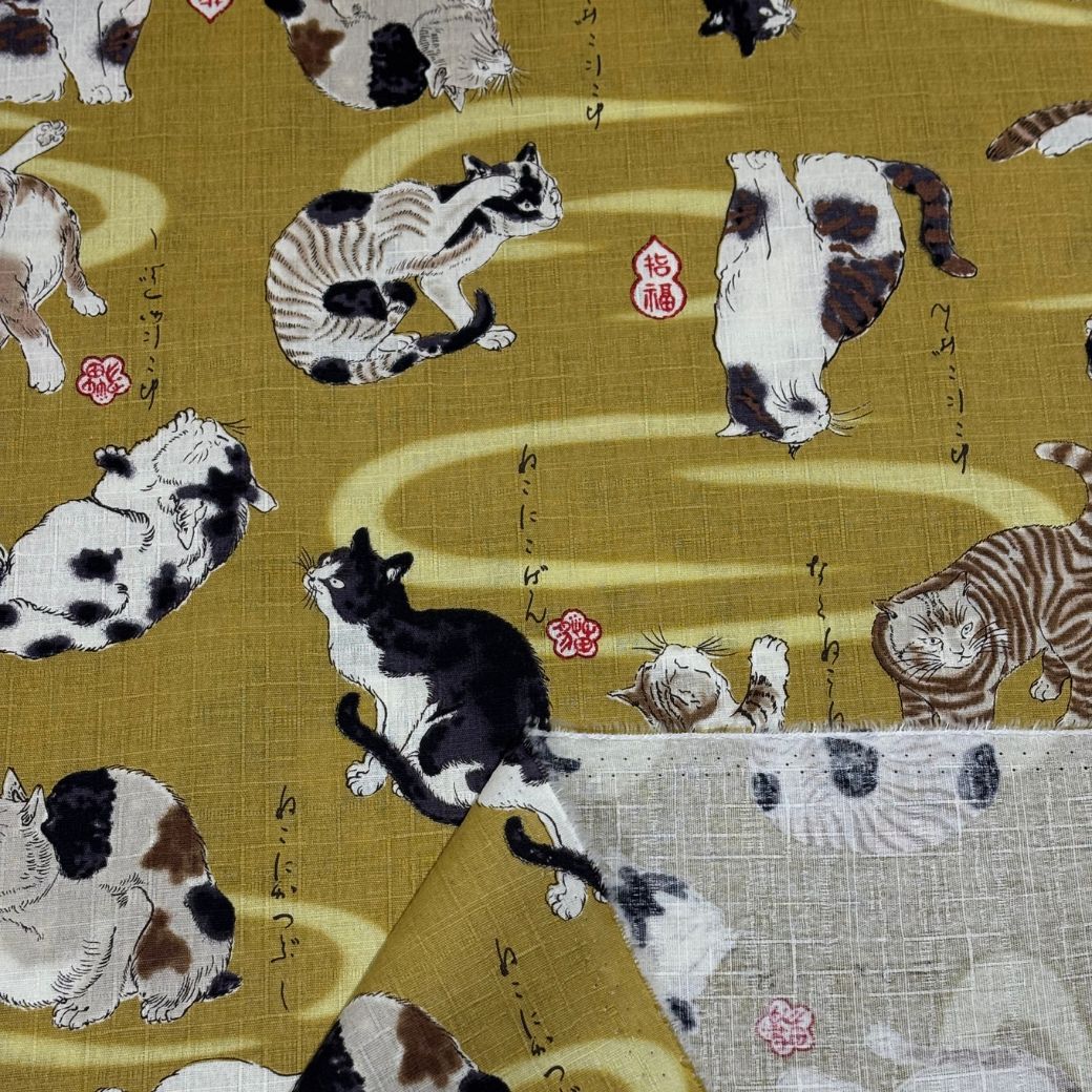 生地 【 和柄ドビー 猫 黄土】 ドビー織り 110cm巾 綿 コットン100％