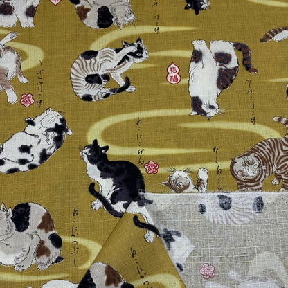 生地 【 和柄ドビー 猫 黄土】 ドビー織り 110cm巾 綿 コットン100％