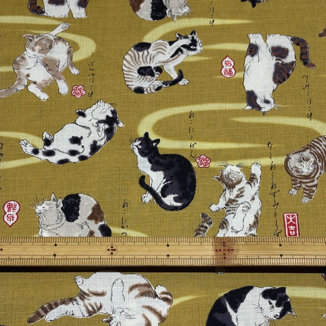 生地 【 和柄ドビー 猫 黄土】 ドビー織り 110cm巾 綿 コットン100％