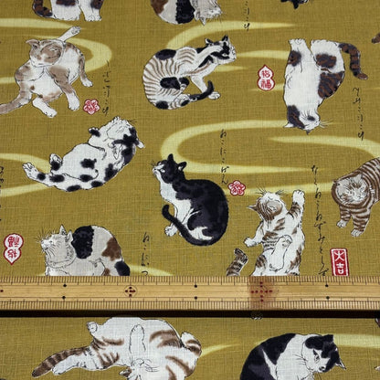 生地 【 和柄ドビー 猫 黄土】 ドビー織り 110cm巾 綿 コットン100％